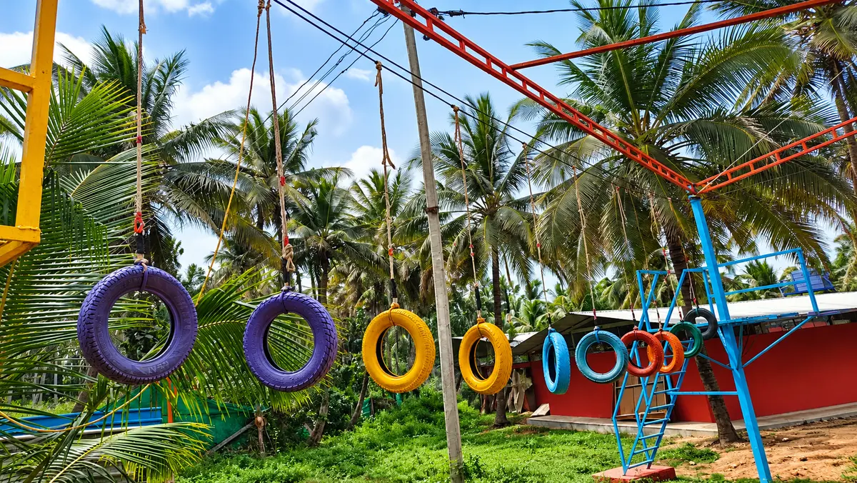 Children enjoying supervised outdoor activities at a family resort near Bangalore